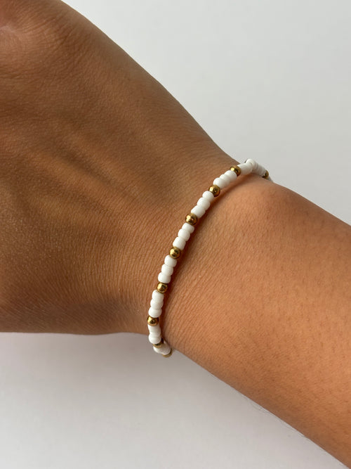 Classic and simple gold and white bead bracelet